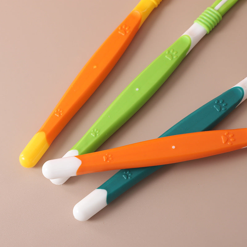 pet toothbrush oral care in vibrant colors orange, green, and yellow for effective and gentle cleaning.