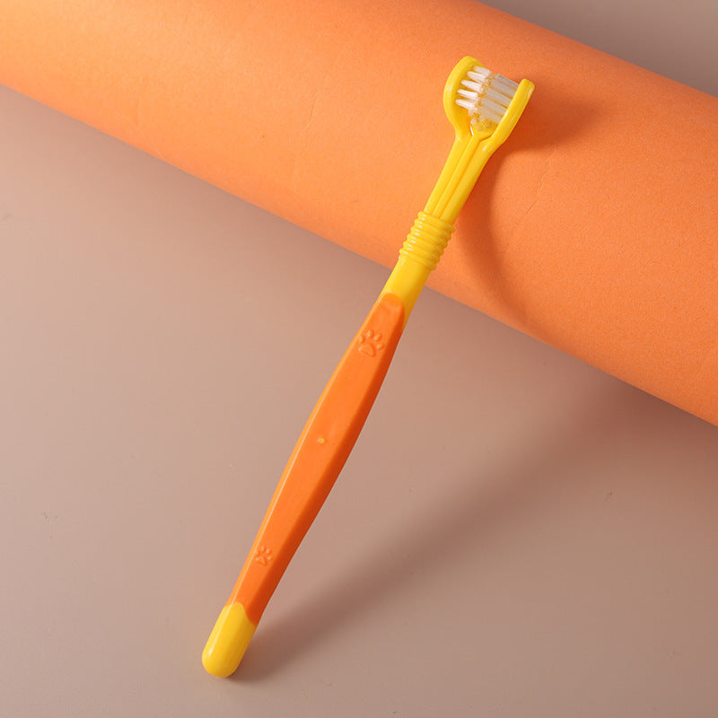 pet toothbrush oral care in vibrant orange and yellow for gentle pet cleaning.